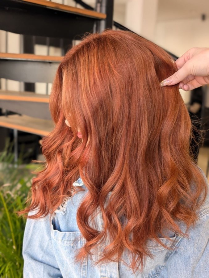 Rich copper colour with loose waves, by Replay Hair & Beauty